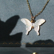 Load image into Gallery viewer, 18K gold plated necklace featuring a mother of pearl butterfly pendant, adjustable between 16 and 18 inches.
