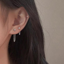 Load image into Gallery viewer, Asymmetrical Korean fashion stud earrings with a 2cm stud and a 3cm chain detail, made from high-quality steel. Inspired by K-Pop star style.
