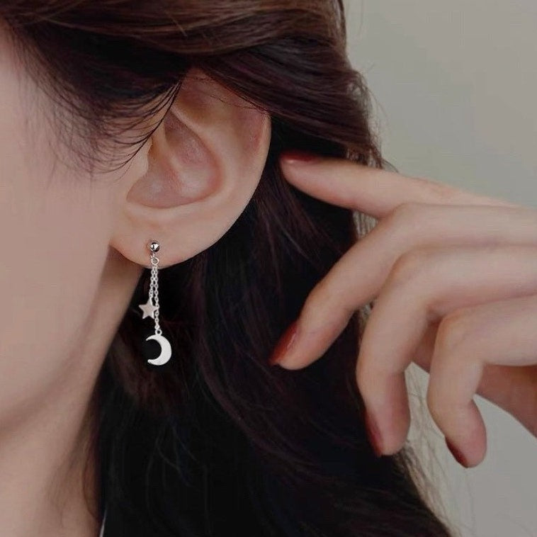 Korean fashion style stainless steel earrings with a 10mm star charm and a 16mm moon charm, featuring a 5 to 5.5cm drop.