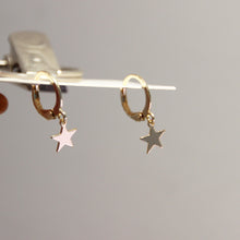 Load image into Gallery viewer, Gold-plated hoop earrings with 10mm star charms, stylish and versatile for any occasion.
