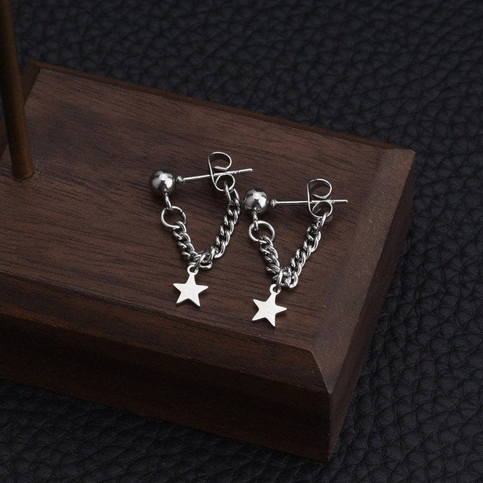 Solid stainless steel earrings with a 10mm star charm and a 3cm short curb chain.