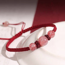 Load image into Gallery viewer, Chinese style gemstone bracelet with obsidian or strawberry quartz beads, woven with red strings, adjustable from 6.5 to 8 inches.
