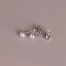 Load image into Gallery viewer, Freshwater button pearl stud earrings in 3mm, 5mm, and 8mm sizes.
