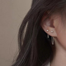 Load image into Gallery viewer, Asymmetrical Korean fashion stud earrings with a 2cm stud and a 3cm chain detail, made from high-quality steel. Inspired by K-Pop star style.
