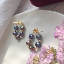 Load image into Gallery viewer, Hypoallergenic surgical steel hoop earrings with 4mm baroque peacock black freeform pearls, elegant and safe for sensitive ears.
