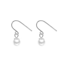 Load image into Gallery viewer, Minimalist surgical steel earrings with 5-6mm button pearls, hypoallergenic and elegant.
