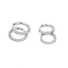 Load image into Gallery viewer, Hoop earrings made from 316 surgical steel, available in 8mm, 10mm, or 12mm sizes.
