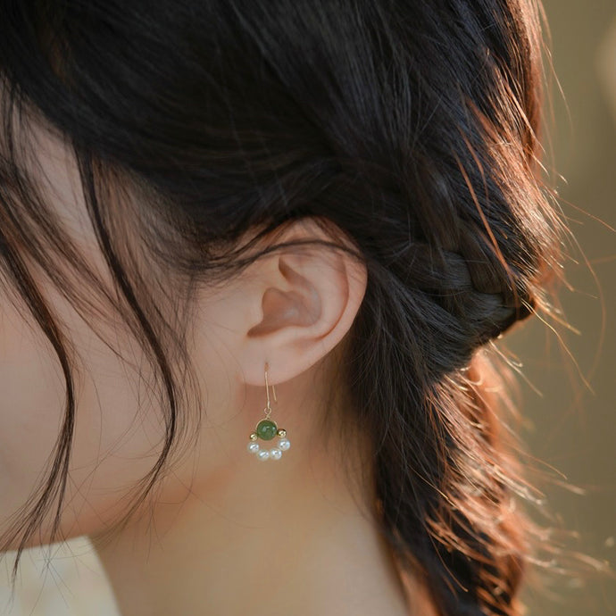 18K gold plated dangle earrings with 8mm natural jade beads and freshwater pearls, perfect for adding a touch of timeless elegance to any outfit.