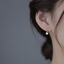 Load image into Gallery viewer, Minimalist surgical steel stud earrings with 10mm star charms, hypoallergenic and perfect for Korean fashion styles.
