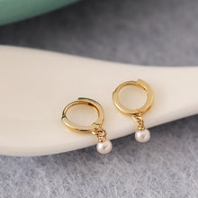 Load image into Gallery viewer, 18K gold-plated hoop earrings with 16mm hoop and small 3mm freshwater button pearls. Elegantly designed for casual or formal wear.
