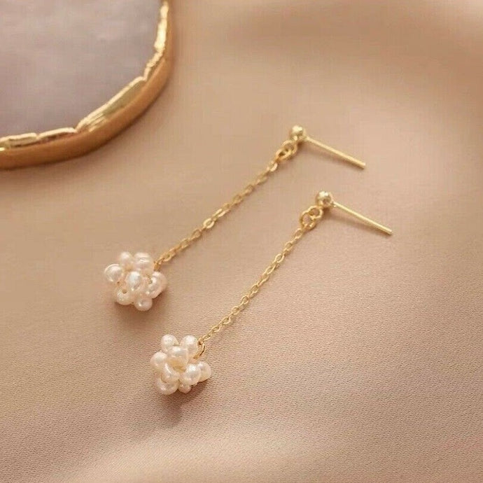 18K gold-plated earrings with small 3-4mm baroque freshwater pearls wire wrapped along a chain. Total length of 6cm, ideal for weddings and formal occasions.