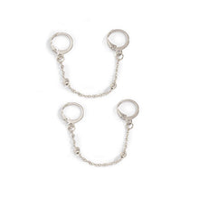 Load image into Gallery viewer, A pair of silver hoop earrings with a chain of moving beads, measuring 5cm in length. The earrings have a punk-inspired design with a double-piercing style.
