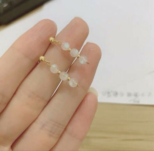 A pair of 18K Gold Plated or surgical steel bar earrings with AAA 4-5mm natural moonstone round beads.