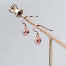 Load image into Gallery viewer, 18K gold plated S925 earrings with 8mm Madagascar rose quartz stones and an intricate flower cap design, perfect for adding elegance to any outfit.
