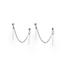 Load image into Gallery viewer, Image of a pair of double piercing earrings made of steel, featuring Korean 2cm rectangle charms and 3cm drops.
