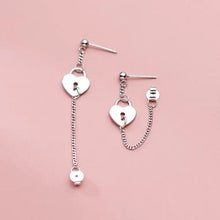 Load image into Gallery viewer, Korean fashion punk earrings with an 18mm love lock charm and 5cm chain, perfect for making a bold and edgy statement.
