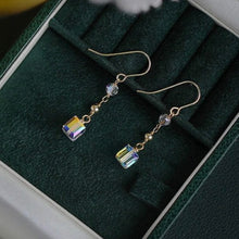 Load image into Gallery viewer, A pair of 18K Gold Plated steel earrings with 6mm clear AB sugar cube beads.
