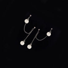 Load image into Gallery viewer, Korean fashion steel double piercing earrings with an 8mm circle charm and 5cm length, designed for a stylish and contemporary look.
