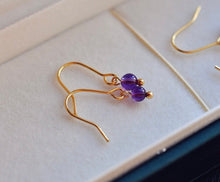 Load image into Gallery viewer, 18K gold-plated earrings with 3-4mm purple natural crystal mini amethyst beads. Elegant and vibrant, ideal for adding a pop of color to your look.
