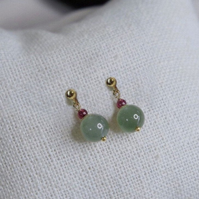 18K gold plated or stainless steel earrings with 3mm garnet and 8mm dark green jade beads, perfect for adding a touch of elegance and luxury to any outfit.