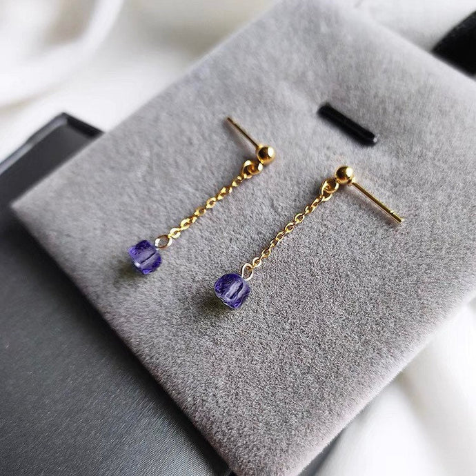 18K gold plated stud earrings with 5mm faceted cube amethyst stones and a 3.5cm short chain, perfect for adding a touch of elegance and charm to any outfit.