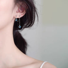 Load image into Gallery viewer, Korean fashion steel double piercing earrings with a 6mm cubic zirconia blue star charm and 4cm length, perfect for a unique and trendy look.
