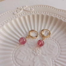 Load image into Gallery viewer, 18K gold plated huggie hoop earrings with AAA-grade natural strawberry quartz 8mm beads, perfect for adding a touch of elegance and femininity to any outfit.
