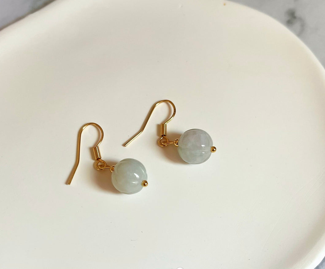 A pair of 18K Gold Plated or S925 Silver earrings with 10mm light green pumpkin jade jadeite gemstones.