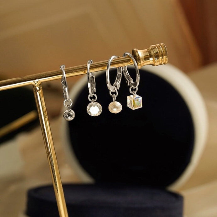 Set of 4 dainty and minimalist earrings, including lever back steel earrings with natural baroque pearls, sugar cube hoops, and CZ beads