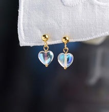 이미지를 갤러리 뷰어에 로드 , 18K gold plated or surgical steel earrings with 8mm clear AB love heart rainbow glass colored glaze lampwork beads, perfect for adding a touch of whimsy and charm to any outfit.
