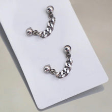 Load image into Gallery viewer, Pair of double piercing earrings made of solid stainless steel, featuring 5mm Cuban chain studs
