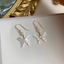 Load image into Gallery viewer, 18K gold plated or surgical steel earrings with a 16mm natural mother of pearl butterfly design and AAA 4mm pearls, perfect for a wedding gift or special occasion.
