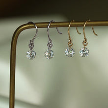 Load image into Gallery viewer, Pair of mini, small, and dainty single earrings featuring 5mm AAAA cubic zirconia dangles, available in gold, silver, or steel.
