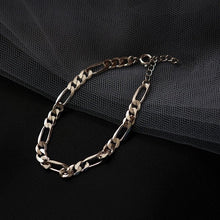 Load image into Gallery viewer, A chunky stainless steel Figaro chain bracelet with 6mm links, available in 6, 7, and 8 inches with an extender and spring ring clasp, showcasing a bold and contemporary design.
