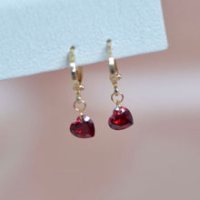 Load image into Gallery viewer, Hoop earrings plated with 18K gold, featuring 6mm garnet red cubic zirconia stones and a lever-back closure. Dainty and minimalist, perfect for bridesmaid jewelry or a Valentine&#39;s Day gift.
