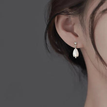 Load image into Gallery viewer, A pair of 18K Gold Plated or surgical steel earrings with white Champaca flower designs made from mother of pearl, measuring 8-9mm.
