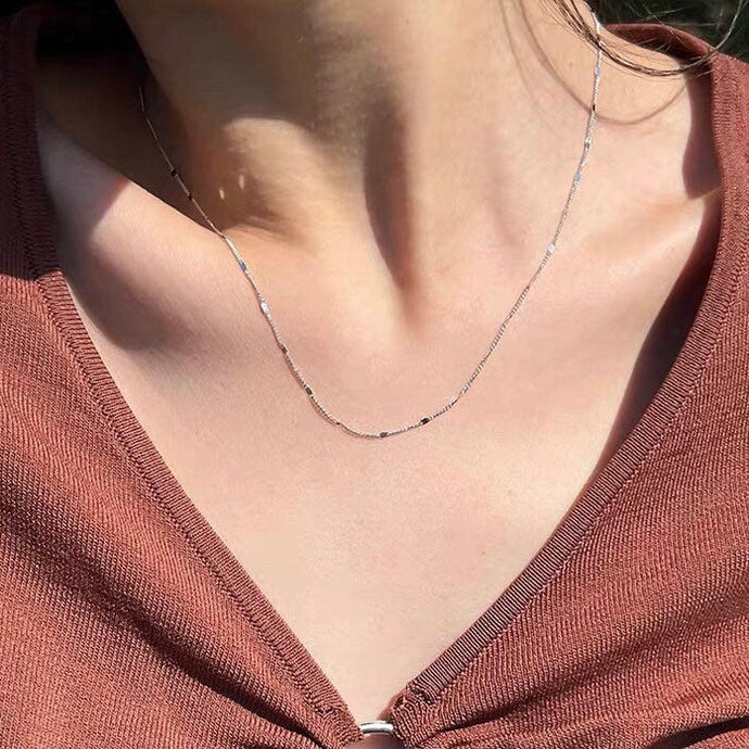 Surgical stainless steel necklace with a 1.5mm dainty sparkle chain, adjustable length from 16 to 18 inches