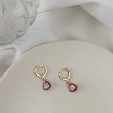 Load image into Gallery viewer, Hoop earrings plated with 18K gold, featuring 6mm garnet red cubic zirconia stones and a lever-back closure. Dainty and minimalist, perfect for bridesmaid jewelry or a Valentine&#39;s Day gift.
