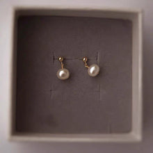 Load image into Gallery viewer, arrings plated with 18K gold, featuring 6mm natural pearls.
