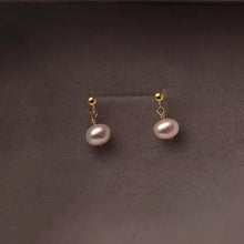 Load image into Gallery viewer, arrings plated with 18K gold, featuring 6mm natural pearls.
