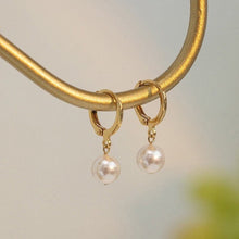 Load image into Gallery viewer, 18K gold plated earrings with 8mm glass crystal pearls, perfect for minimalist everyday jewelry that adds a touch of sophistication to any outfit.
