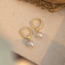 Load image into Gallery viewer, 18K gold plated earrings with 8mm glass crystal pearls, perfect for minimalist everyday jewelry that adds a touch of sophistication to any outfit.
