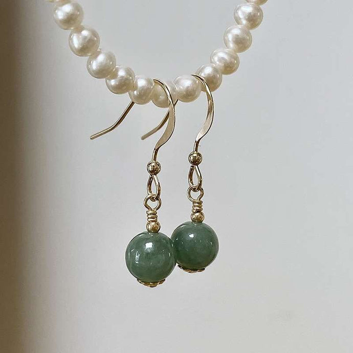 18K gold plated dangle earrings with 8mm jade beads, perfect for adding a touch of sophistication and color to any outfit.