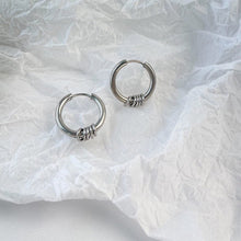 Load image into Gallery viewer, Hoop earrings made of solid surgical steel with circle rings, available in 15mm or 17mm sizes. Hypoallergenic and safe for sensitive ears. Ideal for everyday wear or special occasions.
